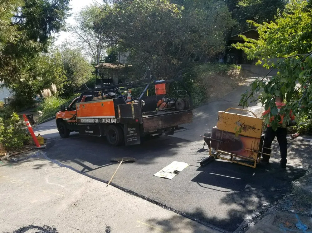 Picture of  A freshly paved driveway glistens under the afternoon sun as a Jackson's Paving & Equipment Rentals, Inc. truck stands by, a testament to their commitment to quality outcomes. With a focus on expert craftsmanship, the company consistently achieved a Highest in Quality rating. Copyright ©2025 Diamond Certified Resource.

 - Jackson's Paving & Equipment Rentals, Inc.