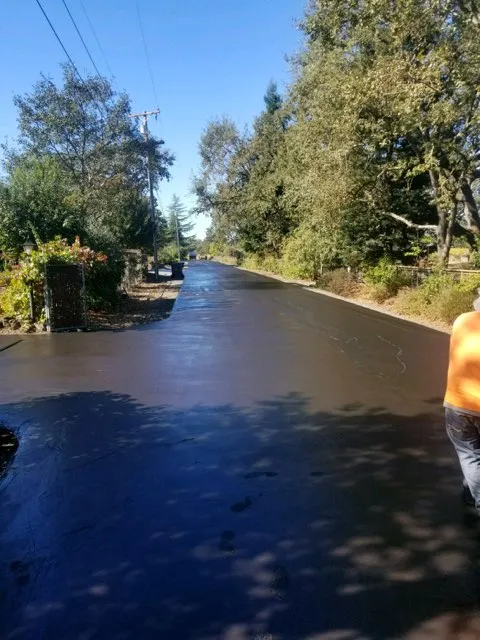 Picture of  A freshly paved road glistens under the sun, showcasing the meticulous work of Jackson's Paving & Equipment Rentals, Inc. This project reflects the company's focus on quality outcomes. Copyright ©2025 Diamond Certified Resource.

 - Jackson's Paving & Equipment Rentals, Inc.