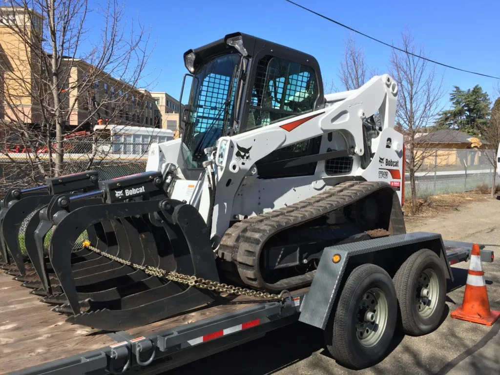 Picture of A Bobcat machine readies for another day of efficient tree care work, showcasing Summit Tree Care's commitment to quality outcomes. Recognized for expertise and quality, they consistently deliver top-rated services. Copyright ©2025 Diamond Certified Resource

 - Summit Tree Care