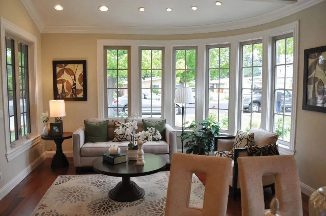 Picture of Bathed in natural light, a tastefully decorated living room showcases the artistry of Stanford Painting, Inc. This serene space reflects the company’s focus on quality outcomes, a testament to its Diamond Certified recognition for expertise and quality. Copyright ©2025 Diamond Certified Resource. - Stanford Painting, Inc.