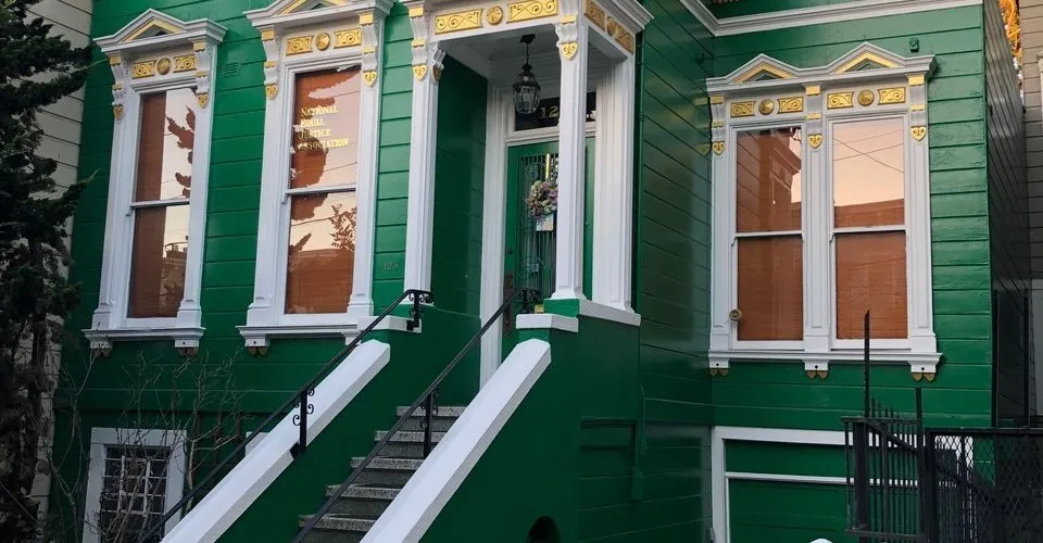 Picture of The vibrant green façade of this restored home showcases Michael Sack Painting, Inc.'s dedication to quality outcomes, reflecting their consistently high customer satisfaction ratings. Copyright ©2025 Diamond Certified Resource. - Michael Sack Painting, Inc.