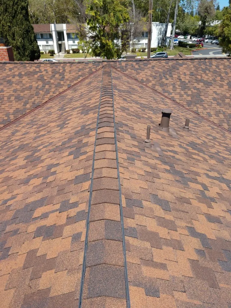 Picture of A precise installation of shingles showcases Bay 101 Roofing, Inc.'s commitment to quality outcomes, enhancing the property's durability. The company consistently achieves a Highest in Quality rating. Copyright ©2025 Diamond Certified Resource. - Bay 101 Roofing, Inc.