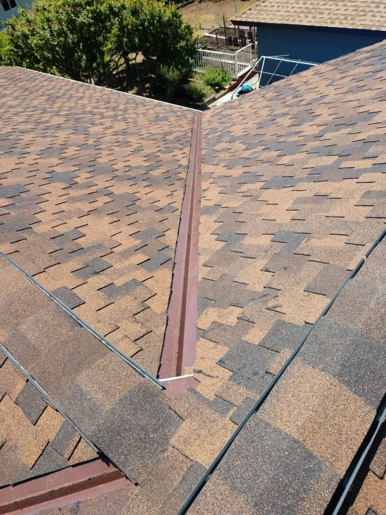 Picture of  A precisely installed roof valley showcases the meticulous workmanship of Bay 101 Roofing, Inc., reflecting the company’s commitment to quality outcomes. Recognized for expertise and quality, they ensure each project stands the test of time. Copyright ©2025 Diamond Certified Resource.

 - Bay 101 Roofing, Inc.