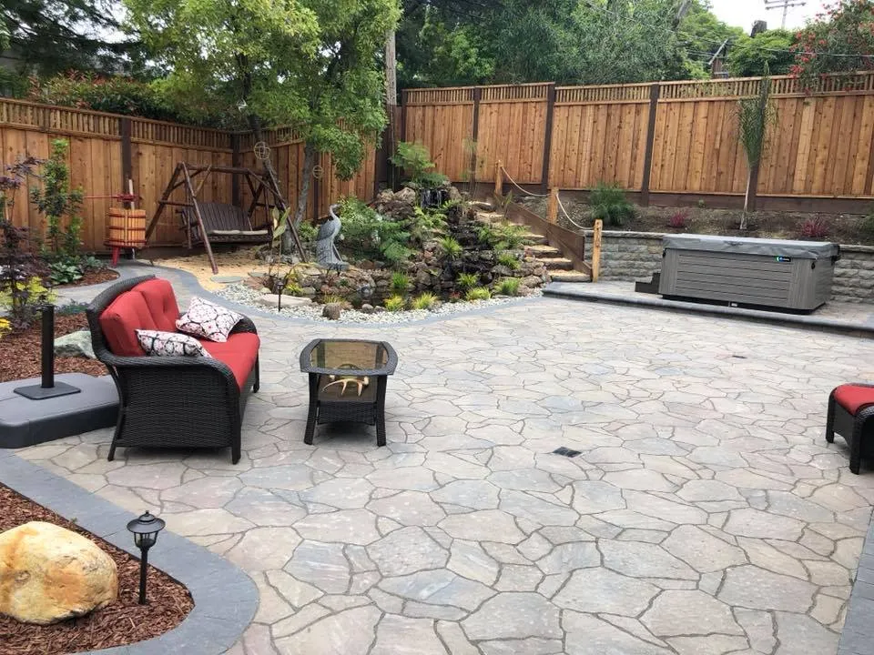 Picture of  A serene backyard retreat features a beautifully paved patio, crafted by Mr. Pavers Contractor Services, Inc. Their dedication to quality outcomes is evident in every detail. Copyright ©2025 Diamond Certified Resource.

 - Mr. Pavers Contractor Services, Inc.