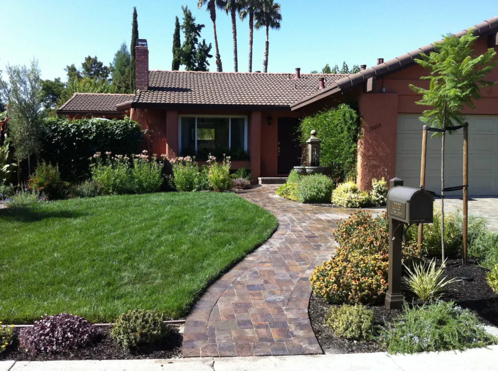 Picture of  A winding brick pathway leads elegantly through lush greenery to a welcoming doorway, showcasing Mr. Pavers Contractor Services, Inc.'s focus on quality outcomes. With a commitment to enhancing curb appeal, the company ensures each project achieves a Highest in Quality rating. Copyright ©2025 Diamond Certified Resource.

 - Mr. Pavers Contractor Services, Inc.