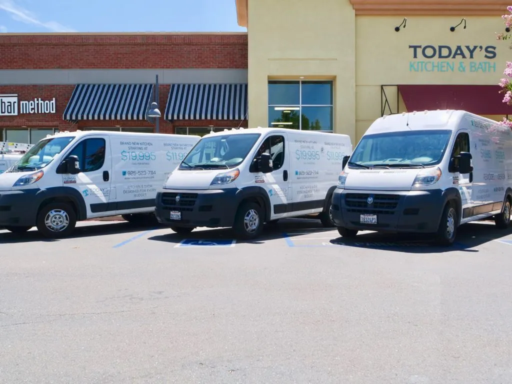 Picture of Three service vans of Today's Kitchen & Bath are parked outside the company premises, ready to deliver top-rated quality and craftsmanship to their customers. Today's Kitchen & Bath is recognized for expertise and quality, consistently achieving a Highest in Quality rating. Copyright ©2025 Diamond Certified Resource

 - Today's Kitchen & Bath