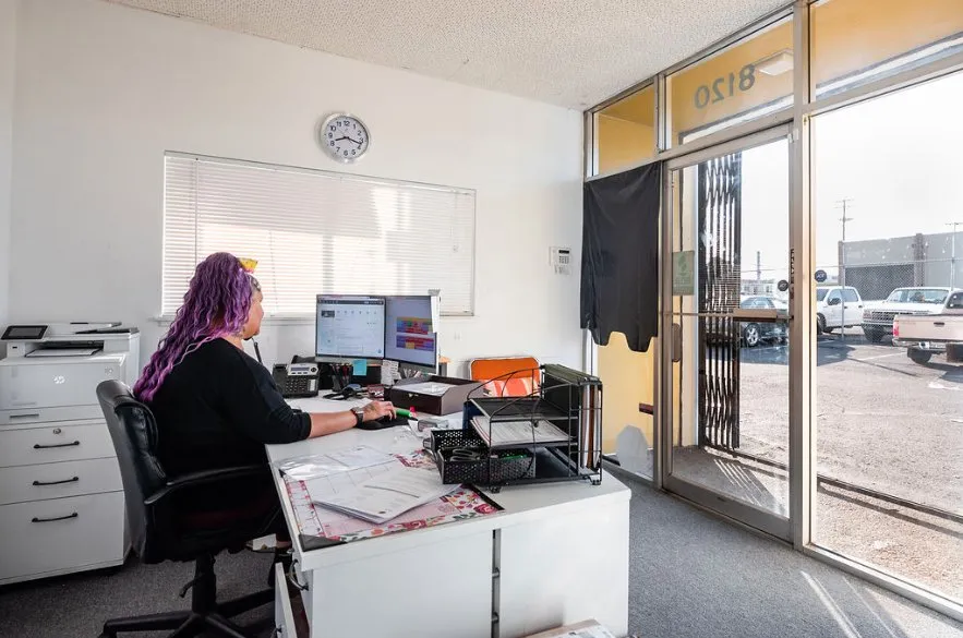 Picture of In the heart of Alley Cat's office, the focus on quality outcomes comes alive as a staff member diligently manages projects, embodying the expertise the company is known for. Copyright ©2025 Diamond Certified Resource

 - Alley Cat