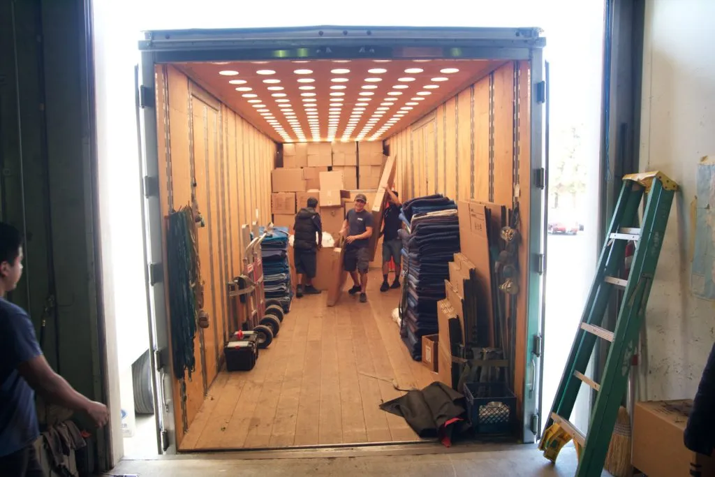 Picture of  Inside a well-lit moving truck, Advantage Moving & Storage employees efficiently organize boxes, reflecting their focus on quality outcomes. The company's commitment to high customer satisfaction is evident in their precise handling. Copyright ©2025 Diamond Certified Resource.

 - Advantage Moving & Storage