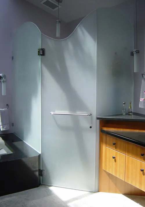 Picture of  Sunlight gently illuminates the elegantly frosted shower enclosure crafted by Schicker Luxury Shower Doors, Inc., highlighting the serene blend of privacy and design excellence. Recognized for expertise and quality, the company consistently achieves the Highest in Quality rating. Copyright ©2025 Diamond Certified Resource.

 - Schicker Luxury Shower Doors, Inc.