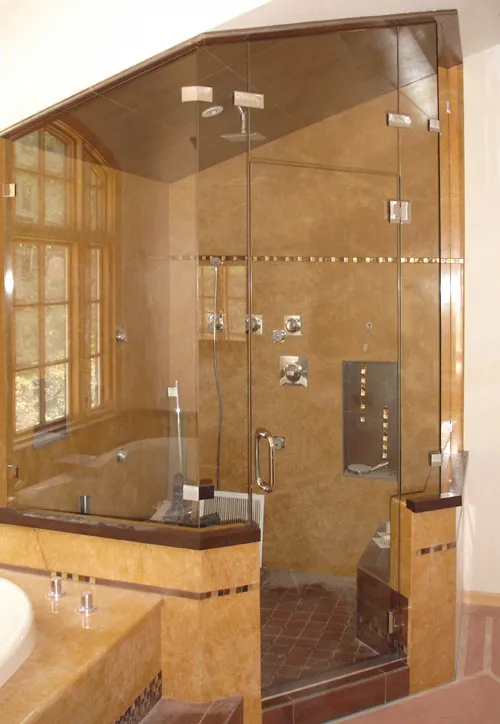 Picture of  A stunning frameless glass shower enclosure showcases Schicker Luxury Shower Doors, Inc.'s dedication to quality outcomes. This elegant design exemplifies their expertise in creating luxurious bathroom spaces. Copyright ©2025 Diamond Certified Resource.

 - Schicker Luxury Shower Doors, Inc.