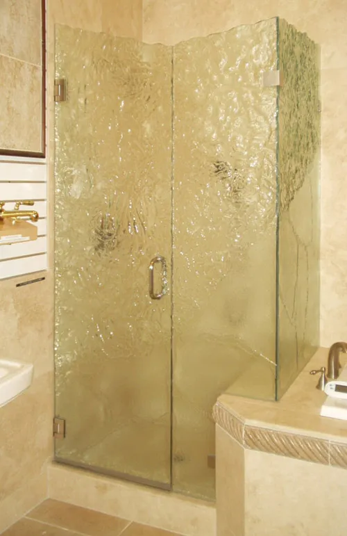 Picture of  The elegance of textured glass shines in a bespoke installation by Schicker Luxury Shower Doors, Inc. This unique design reflects the company’s focus on quality outcomes, creating a sophisticated bath space. Copyright ©2025 Diamond Certified Resource.

 - Schicker Luxury Shower Doors, Inc.