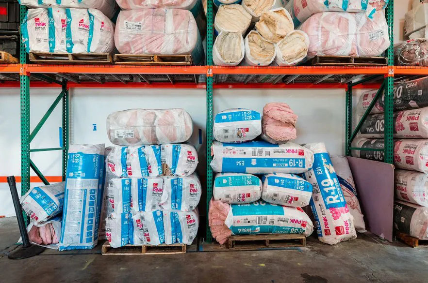 Picture of In the organized warehouse of Alley Cat, stacks of insulation materials await their next project. This commitment to quality and precision underscores the company's dedication to excellence, consistently achieving a Highest in Quality rating. Copyright ©2025 Diamond Certified Resource - Alley Cat