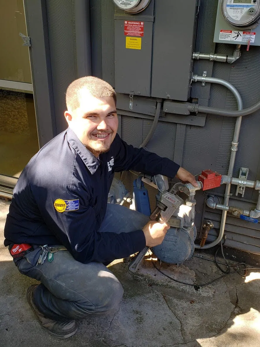 Picture of A technician from Big Blue Plumbing skillfully adjusts equipment, embodying the company's commitment to quality outcomes. Recognized for expertise, Big Blue Plumbing consistently achieves high customer satisfaction. Copyright ©2025 Diamond Certified Resource

 - Big Blue Plumbing