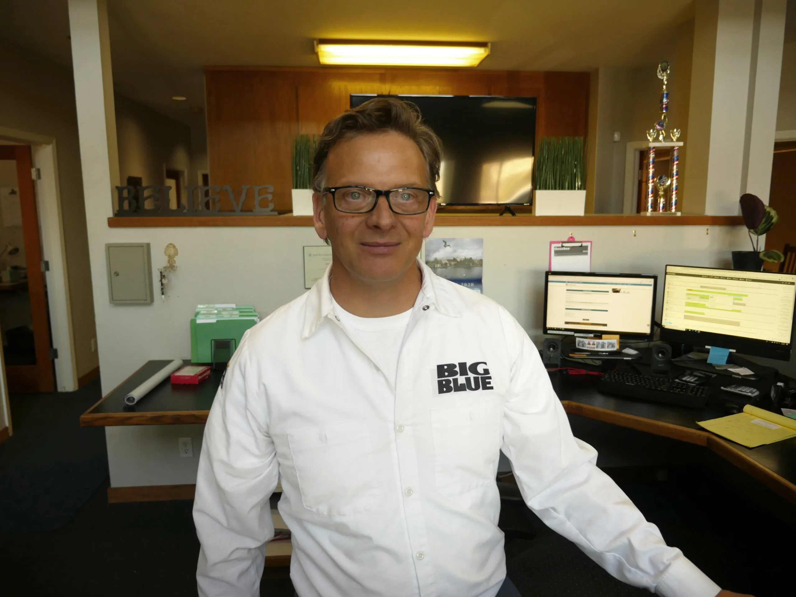 Picture of In the heart of Big Blue Plumbing's office, a representative exudes confidence, embodying the companyâ€™s commitment to quality outcomes. Their dedication is reflected in their high customer satisfaction ratings. Copyright ©2025 Diamond Certified Resource - Big Blue Plumbing