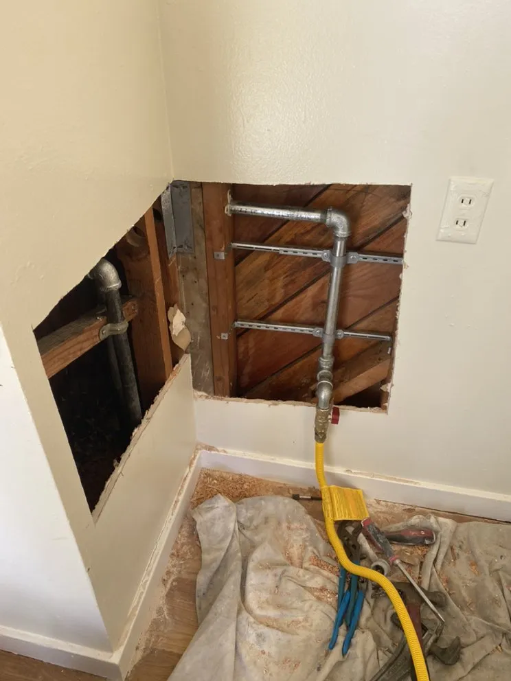 Picture of In the corner of a quiet room, an intricate network of new piping reveals the skillful work of Discover Plumbing & Rooter, a company recognized for expertise and quality. Copyright ©2025 Diamond Certified Resource

 - Discover Plumbing & Rooter