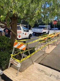 Picture of Amidst the bustle of a sunny day, Discover Plumbing & Rooter ensures safety and quality with a carefully constructed pathway beside their service vehicle. Known for focusing on quality outcomes, they bring expertise to every project. Copyright ©2025 Diamond Certified Resource

 - Discover Plumbing & Rooter