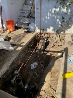 Picture of In a quiet corner of a sunlit yard, Discover Plumbing & Rooter expertly navigates the intricacies of an outdoor plumbing repair, showcasing their focus on quality outcomes. Copyright ©2025 Diamond Certified Resource

 - Discover Plumbing & Rooter