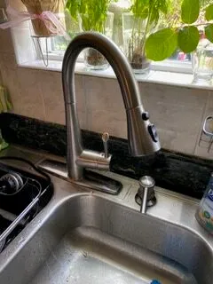 Picture of A newly installed sleek kitchen faucet glistens in the morning light, hinting at the quality craftsmanship of Discover Plumbing & Rooter, a company recognized for expertise and quality. Copyright ©2025 Diamond Certified Resource

 - Discover Plumbing & Rooter