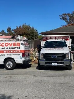 Picture of A Discover Plumbing & Rooter van and truck are parked side by side outside a residential property, symbols of the companyâ€™s commitment to quality outcomes and customer satisfaction. Copyright ©2025 Diamond Certified Resource

 - Discover Plumbing & Rooter
