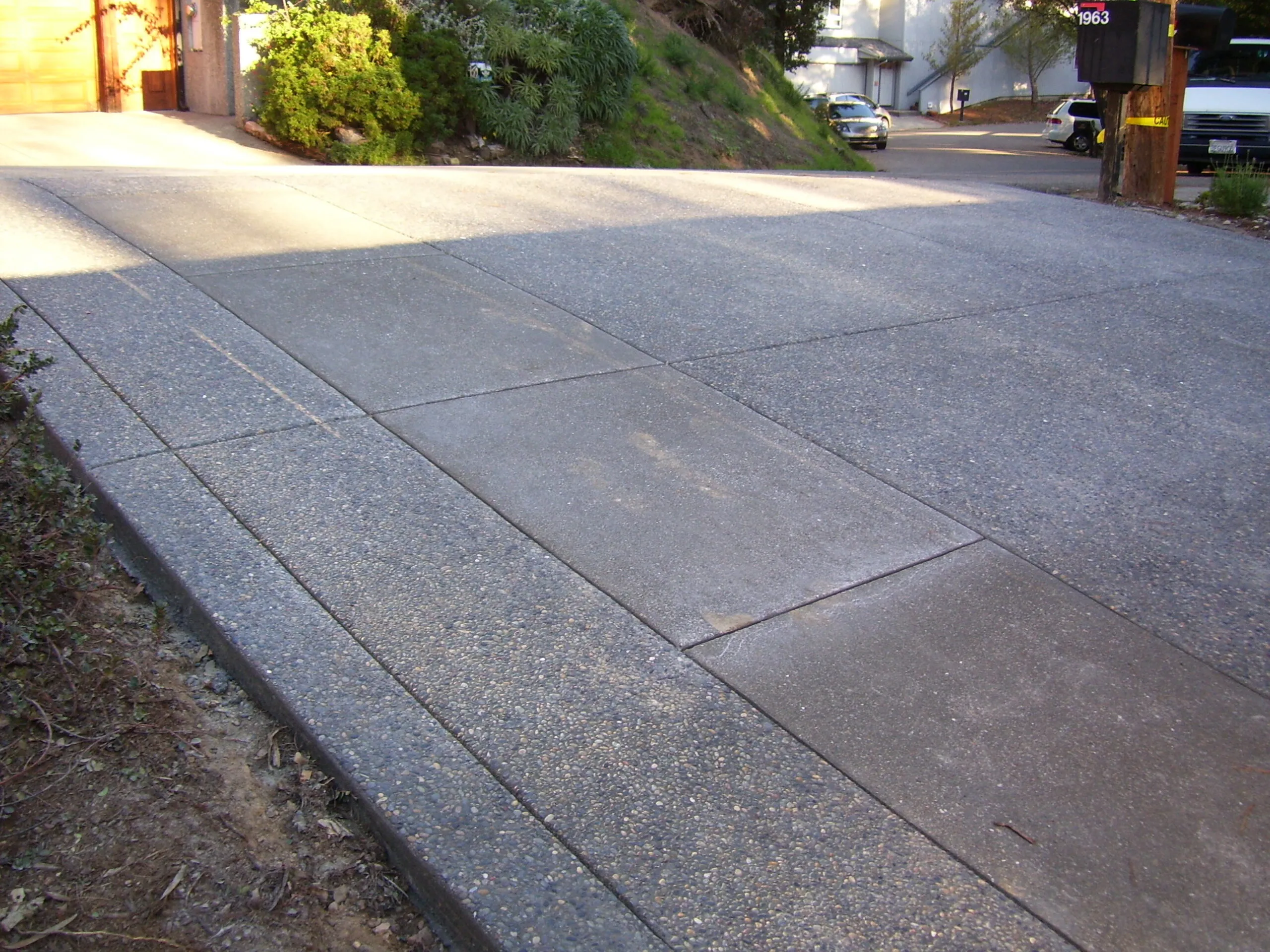 Picture of  A precisely finished concrete driveway reflects the superior craftsmanship of Paradigm Concrete & Construction, Inc., underscoring their commitment to quality outcomes. The meticulous detail is a testament to their high customer satisfaction ratings. Copyright ©2025 Diamond Certified Resource.

 - Paradigm Concrete & Construction, Inc.