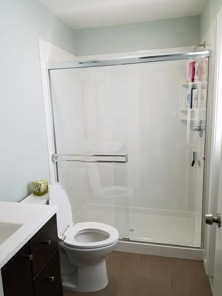 Picture of  In a serene bathroom setting, the pristine shower door reflects A Ramos Construction, Inc.'s dedication to excellence. Known for high customer satisfaction ratings, the company's expertise shines through in every detail. Copyright ©2025 Diamond Certified Resource.

 - A Ramos Construction, Inc.