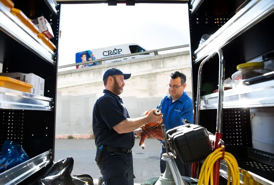 Picture of In the heart of a bustling city, a Chosen Rooter & Plumbing technician engages with a client, showcasing the company’s commitment to quality outcomes. The tools of the trade are at hand, symbolizing expertise and readiness to tackle any plumbing challenge. This dedication to service is reflected in their high customer satisfaction ratings. Copyright ©2025 Diamond Certified Resource - Chosen Rooter & Plumbing, Inc.