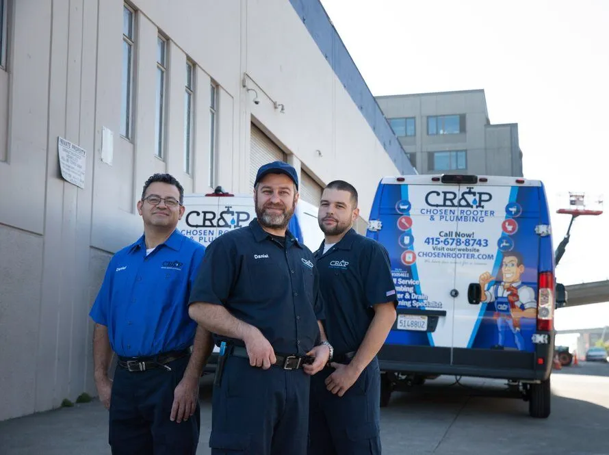 Picture of Three dedicated team members of Chosen Rooter & Plumbing, Inc. stand proudly in front of their service vehicle, embodying the company's commitment to quality outcomes. Their expertise and teamwork reflect the high customer satisfaction ratings that set them apart in the plumbing industry. Trust in their skills for all your plumbing needs. Copyright ©2025 Diamond Certified Resource - Chosen Rooter & Plumbing, Inc.