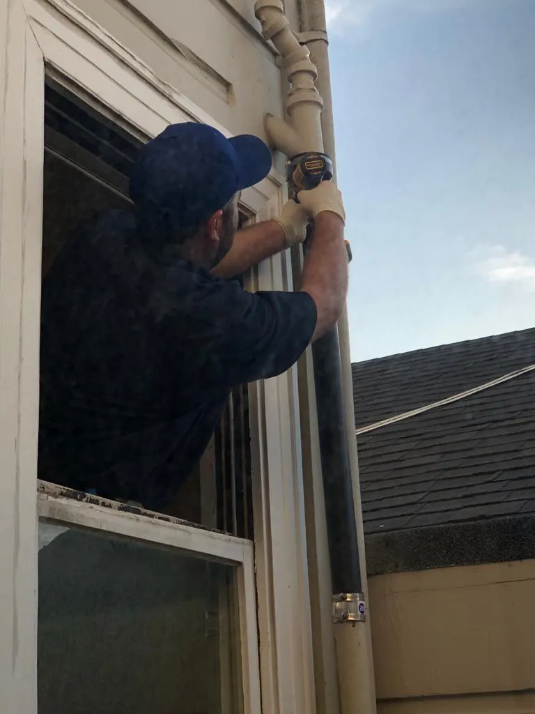 Picture of A technician from Chosen Rooter & Plumbing, Inc. skillfully works on a plumbing installation, demonstrating the company's commitment to quality outcomes. This attention to detail ensures that every project meets the highest standards, reflecting their recognition for expertise and quality. Copyright ©2025 Diamond Certified Resource - Chosen Rooter & Plumbing, Inc.