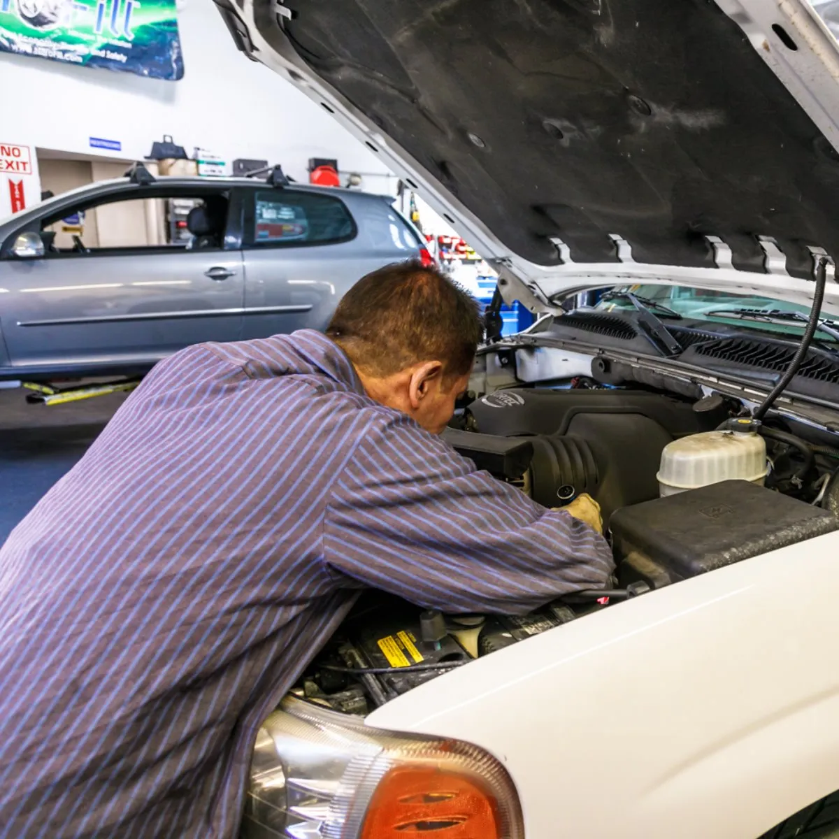 Picture of A technician at Dana Meyer Auto Care meticulously inspects a vehicle's engine, underscoring the companyâ€™s focus on quality outcomes. This dedication is why theyâ€™ve earned Diamond Certified. Copyright ©2025 Diamond Certified Resource - Dana Meyer Auto Care