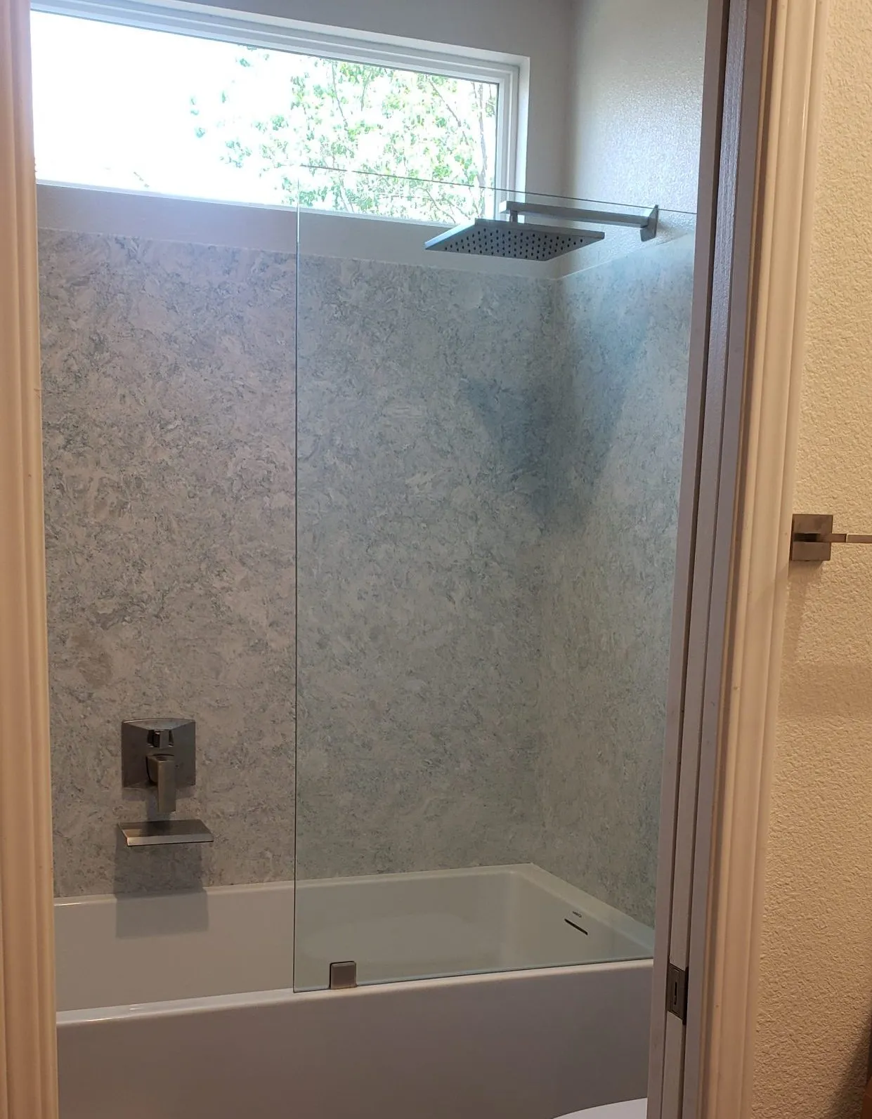 Picture of  A Ramos Construction, Inc. transforms a bathroom space into a serene retreat with a sleek shower design, emphasizing their focus on quality outcomes. Copyright ©2025 Diamond Certified Resource.

 - A Ramos Construction, Inc.