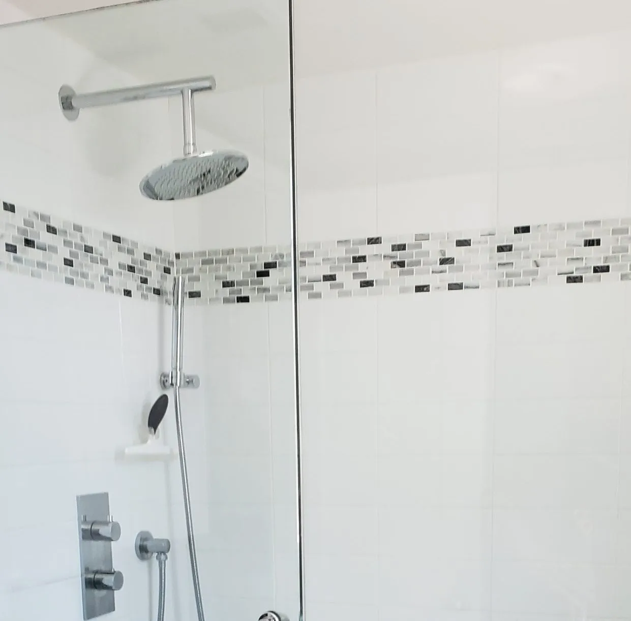 Picture of  A Ramos Construction, Inc. showcases their commitment to quality with this sleek shower design, highlighting their top-rated expertise in creating elegant bathroom spaces. Copyright ©2025 Diamond Certified Resource.

 - A Ramos Construction, Inc.