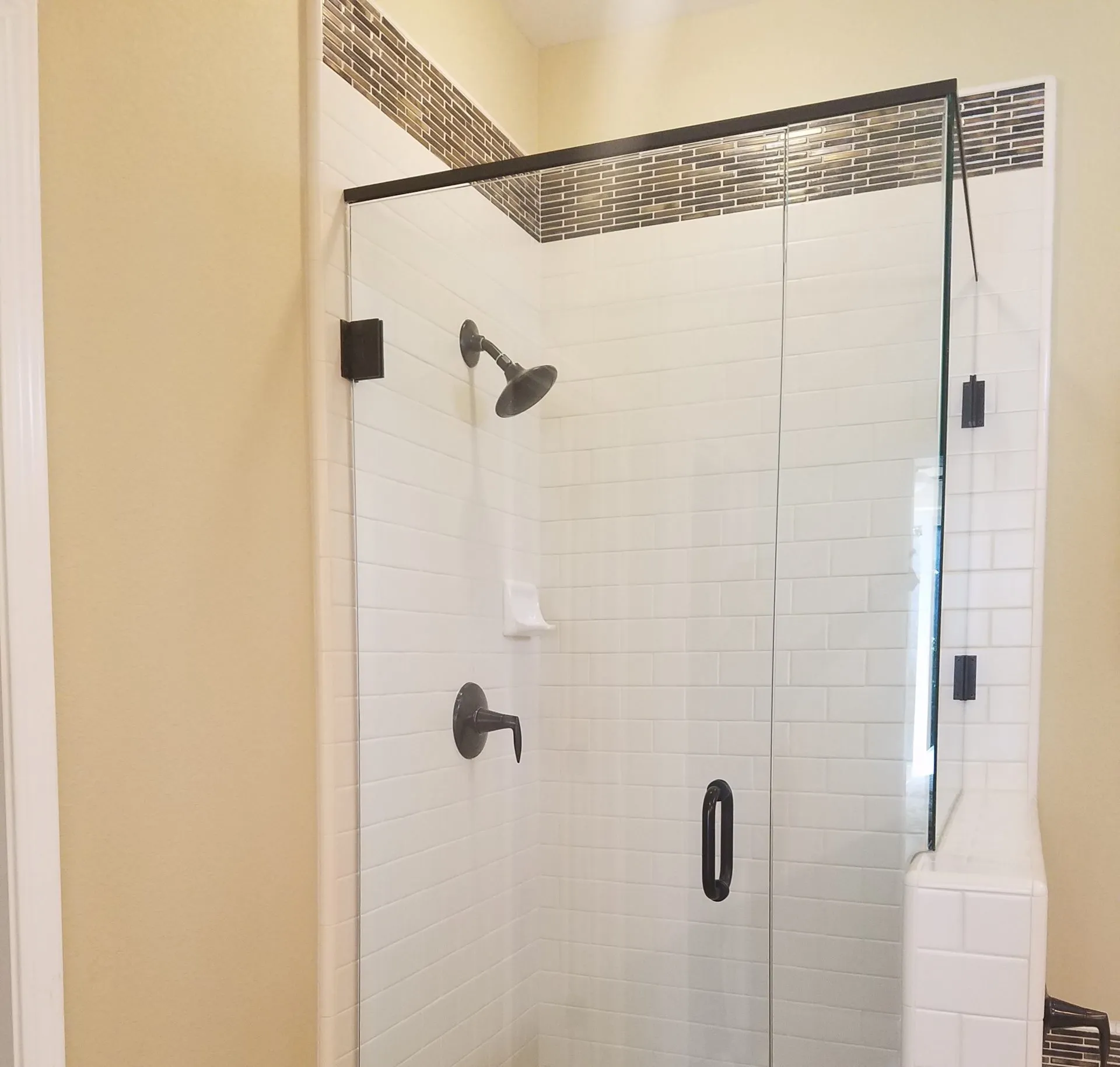 Picture of  A Ramos Construction, Inc. showcases their craftsmanship with a sleek, modern shower enclosure, combining glass and tile for a clean, elegant finish. Recognized for expertise and quality, the company consistently delivers top-tier results. Copyright ©2025 Diamond Certified Resource.

 - A Ramos Construction, Inc.