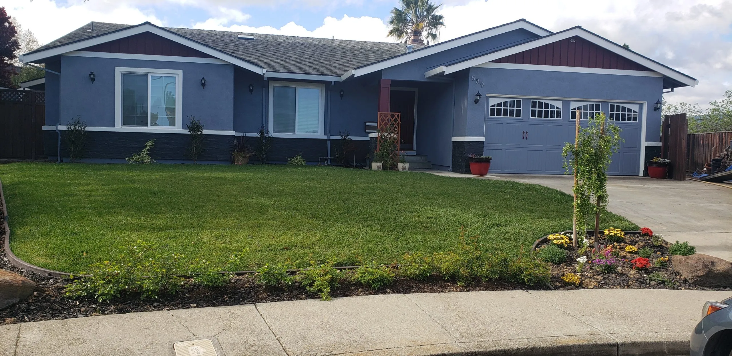 Picture of  A freshly renovated facade reflects A Ramos Construction, Inc.'s commitment to quality outcomes, showcasing a meticulous blend of color and design. The lush lawn and vibrant garden hint at careful attention to every detail. The company focuses on quality outcomes. Copyright ©2025 Diamond Certified Resource.

 - A Ramos Construction, Inc.