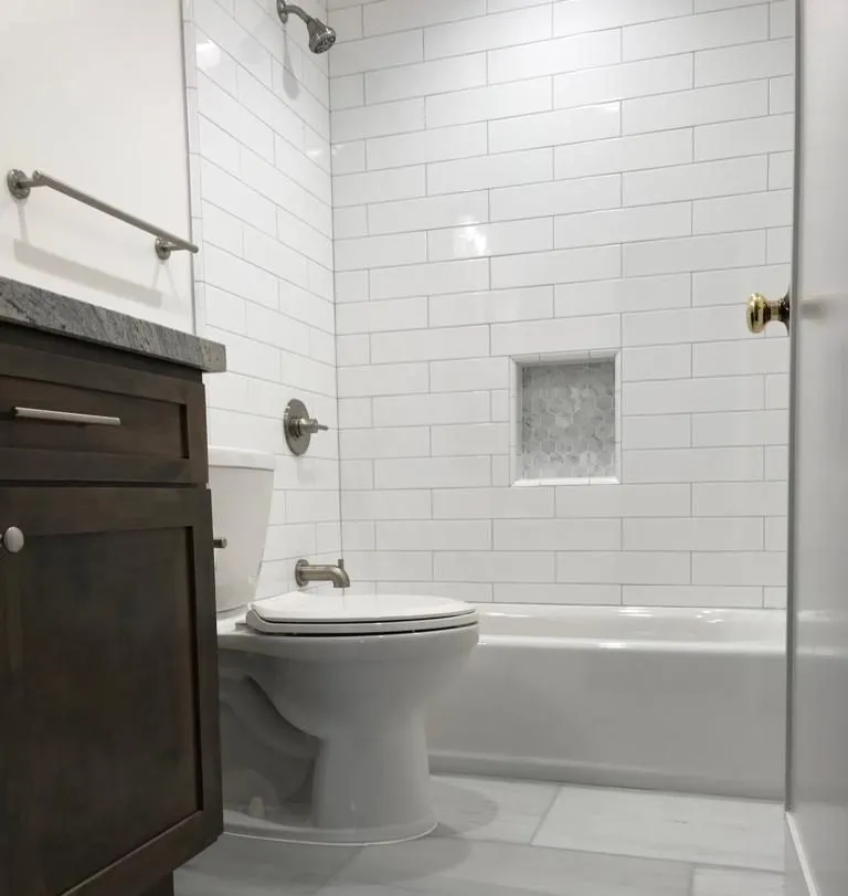 Picture of  The clean, modern lines of this newly remodeled bathroom showcase the craftsmanship of A Ramos Construction, Inc., a company recognized for expertise and quality. Their attention to detail is evident in the precision of the tile work. Copyright ©2025 Diamond Certified Resource.

 - A Ramos Construction, Inc.