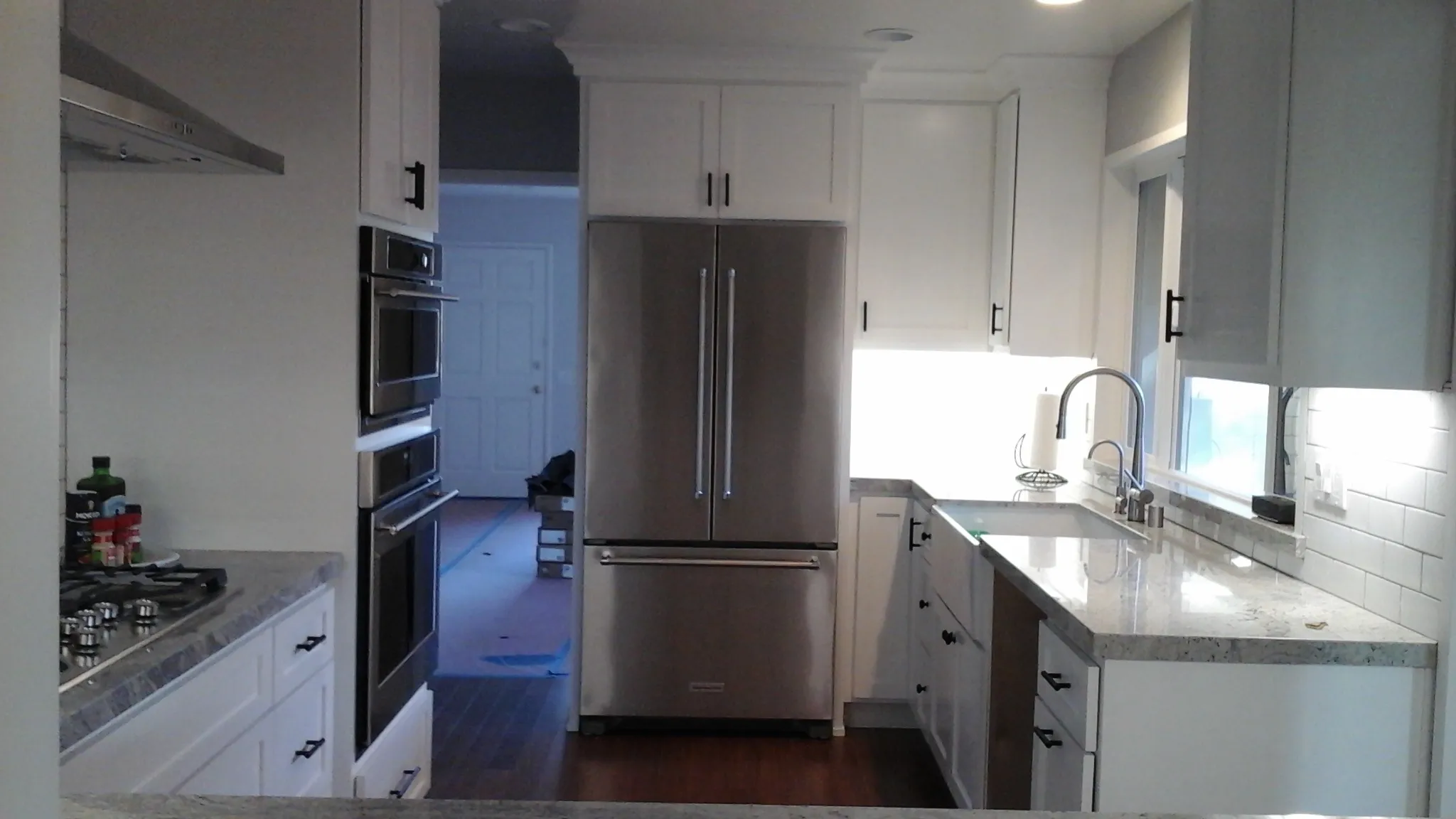 Picture of A Ramos Construction, Inc. showcases a pristine kitchen remodel, where sleek stainless steel appliances and modern cabinetry underline their dedication to quality outcomes. Recognized for expertise and quality, the company transforms spaces with precision and care. Copyright ©2025 Diamond Certified Resource

 - A Ramos Construction, Inc.