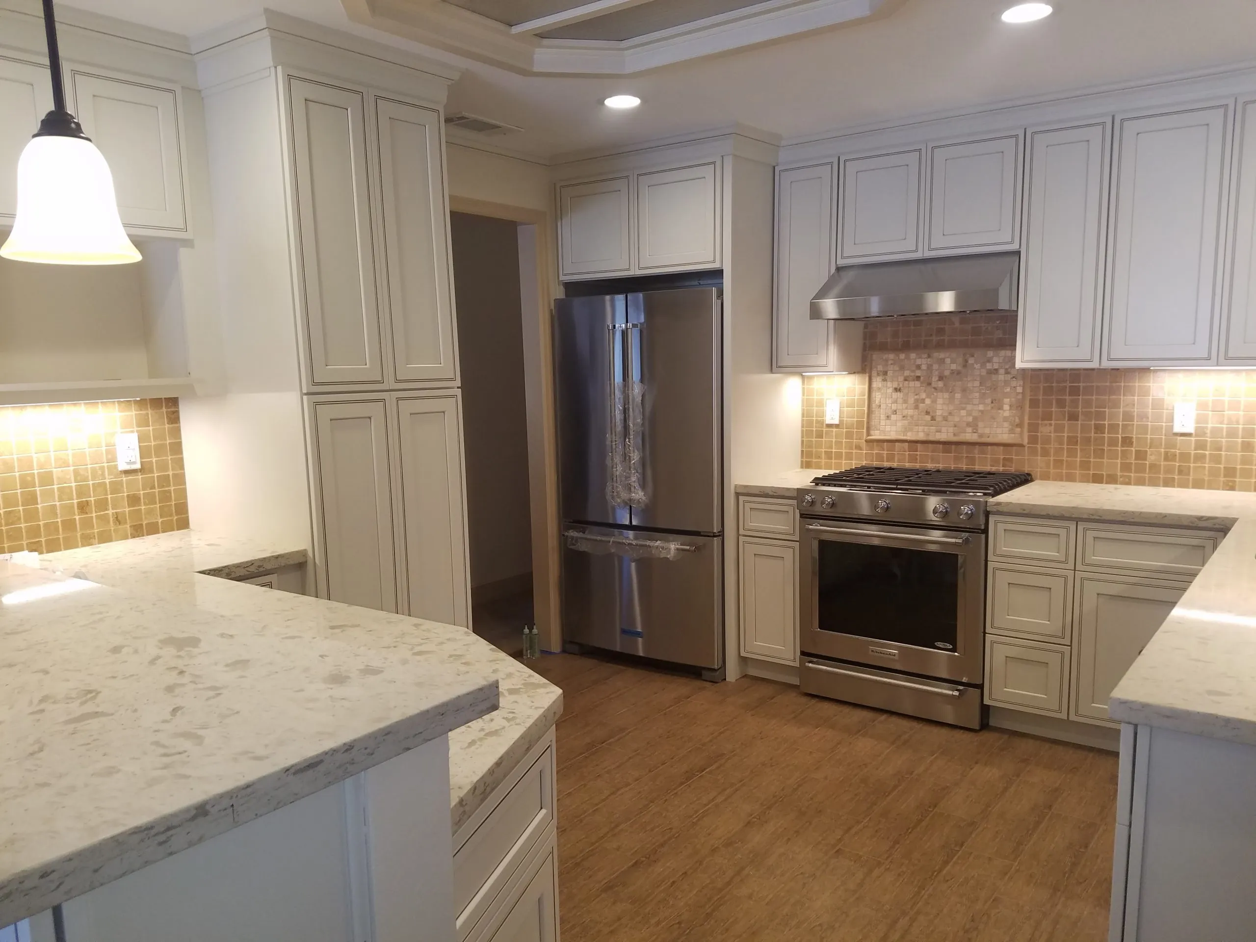 Picture of A Ramos Construction, Inc. showcases a newly renovated kitchen featuring sleek stainless steel appliances and elegant cabinetry. This transformation highlights the companyâ€™s focus on quality outcomes and exceptional design. Copyright ©2025 Diamond Certified Resource

 - A Ramos Construction, Inc.