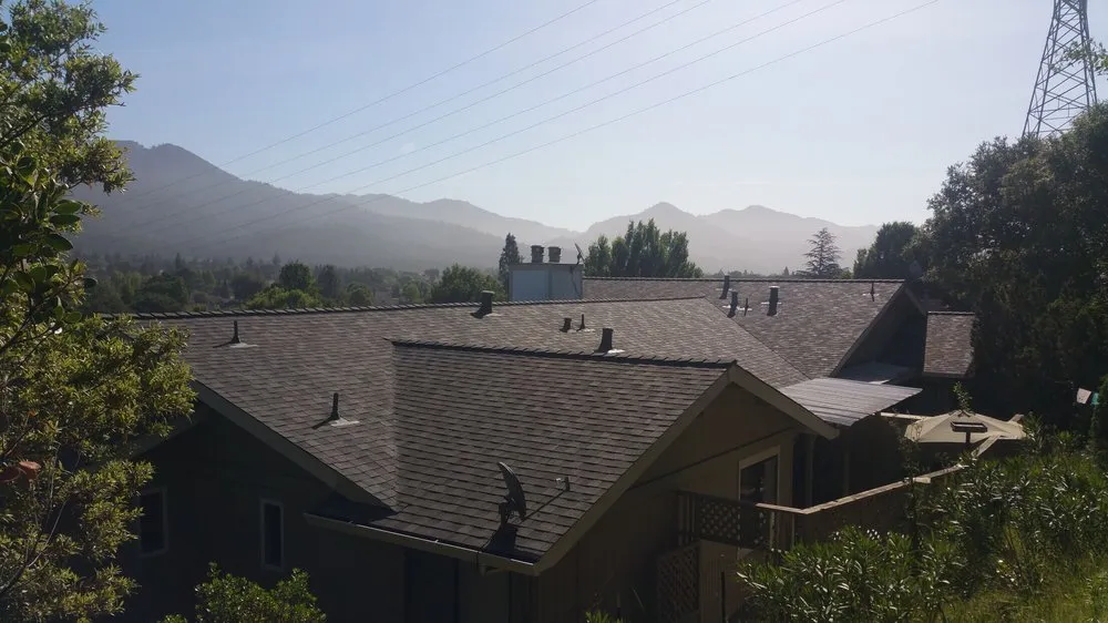 Picture of Morning light bathes a newly installed roof, showcasing Crandall Roofing Inc.'s commitment to quality outcomes. With serene mountains as a backdrop, this project underscores their high customer satisfaction ratings. Copyright ©2025 Diamond Certified Resource - Crandall Roofing Inc.