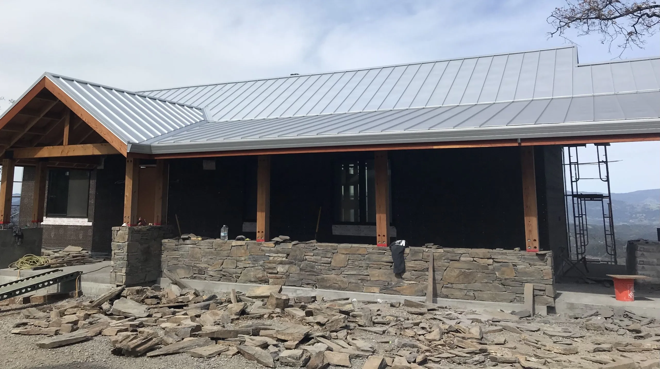 Picture of Crandall Roofing Inc. expertly installs a sleek metal roof on a construction site, showcasing their commitment to quality outcomes. Recognized for expertise and quality, they transform structures with precision. Copyright ©2025 Diamond Certified Resource

 - Crandall Roofing Inc.