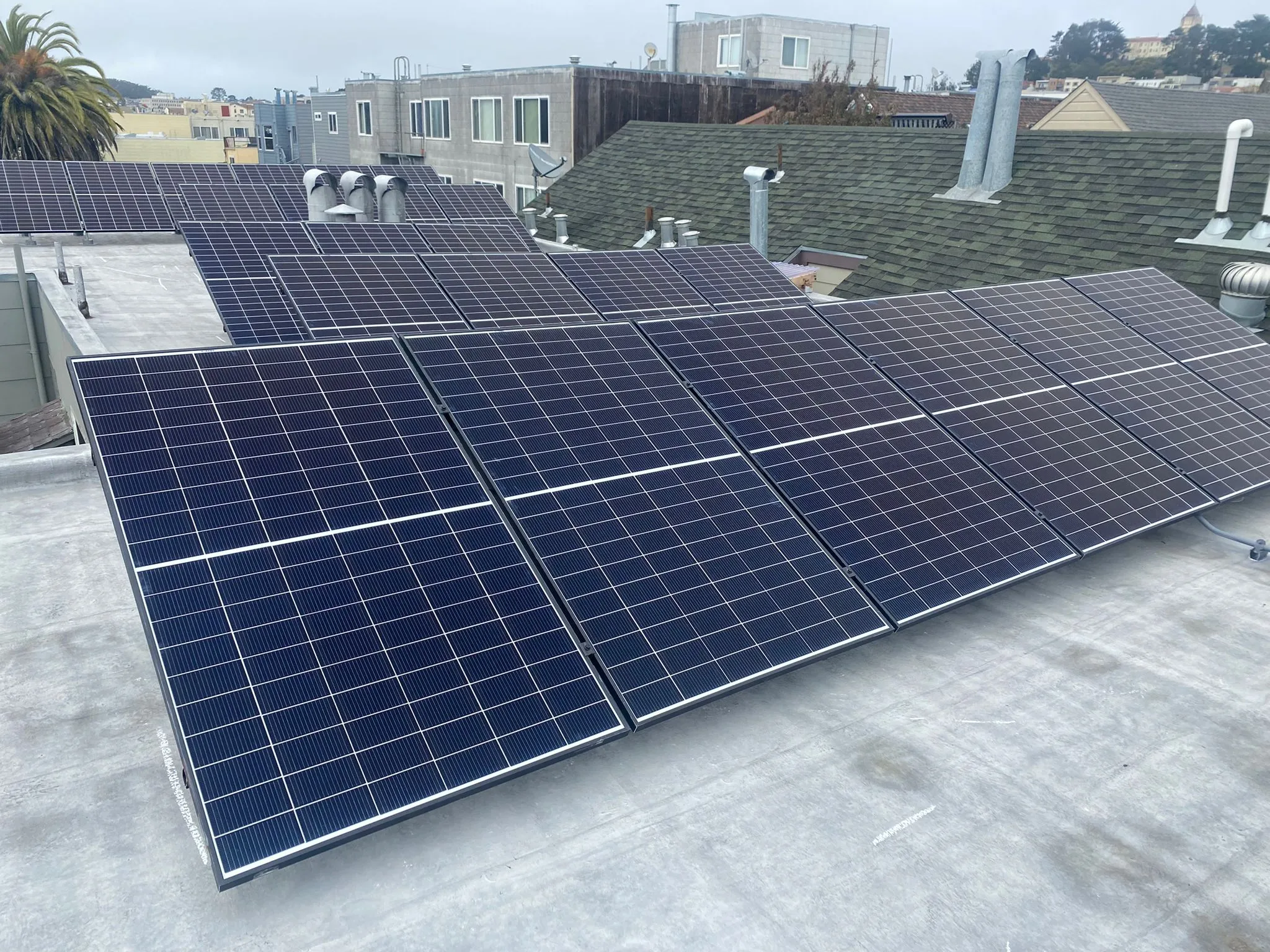 Picture of On a clear morning, lines of orderly solar panels gleam atop rooftops, quietly powering the neighborhood. SolarUnion's commitment to quality outcomes reflects in every installation. Copyright ©2025 Diamond Certified Resource

 - SolarUnion