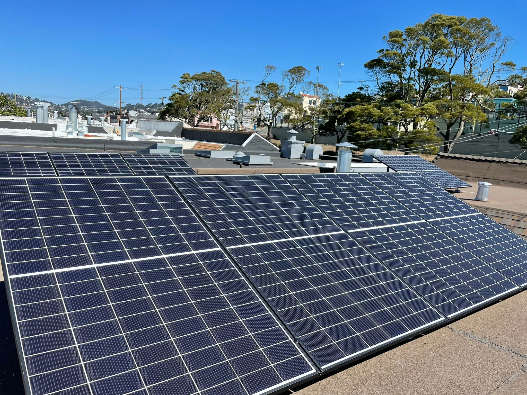 Picture of Under a clear blue sky, a rooftop is adorned with precisely aligned solar panels, capturing the sunâ€™s energy. SolarUnion, recognized for expertise and quality, ensures these installations meet the highest standards. Copyright ©2025 Diamond Certified Resource

 - SolarUnion