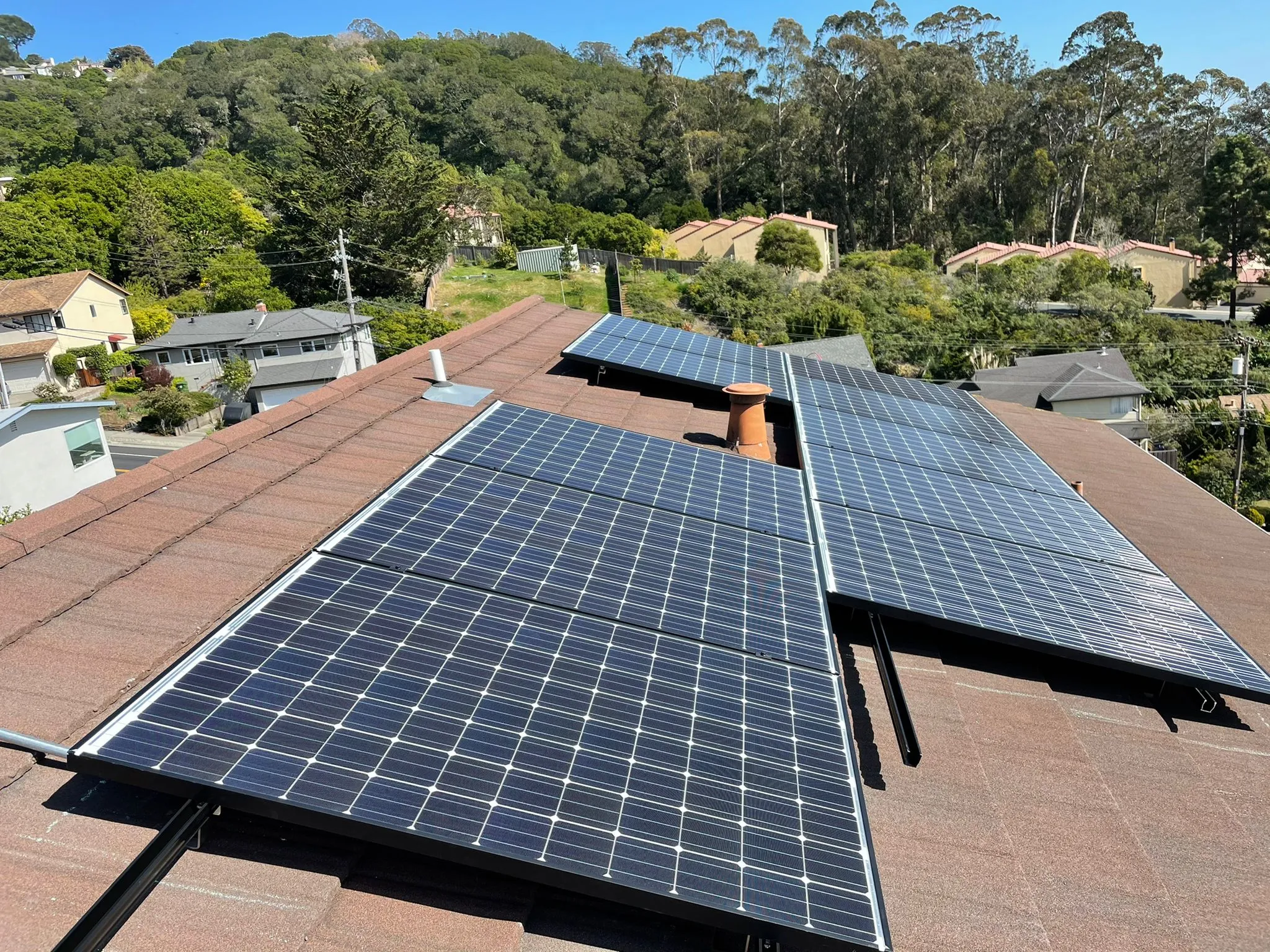 Picture of Solar panels glisten under a clear sky atop a residential roof, reflecting SolarUnion's commitment to high customer satisfaction through quality solar solutions. Copyright ©2025 Diamond Certified Resource

 - SolarUnion