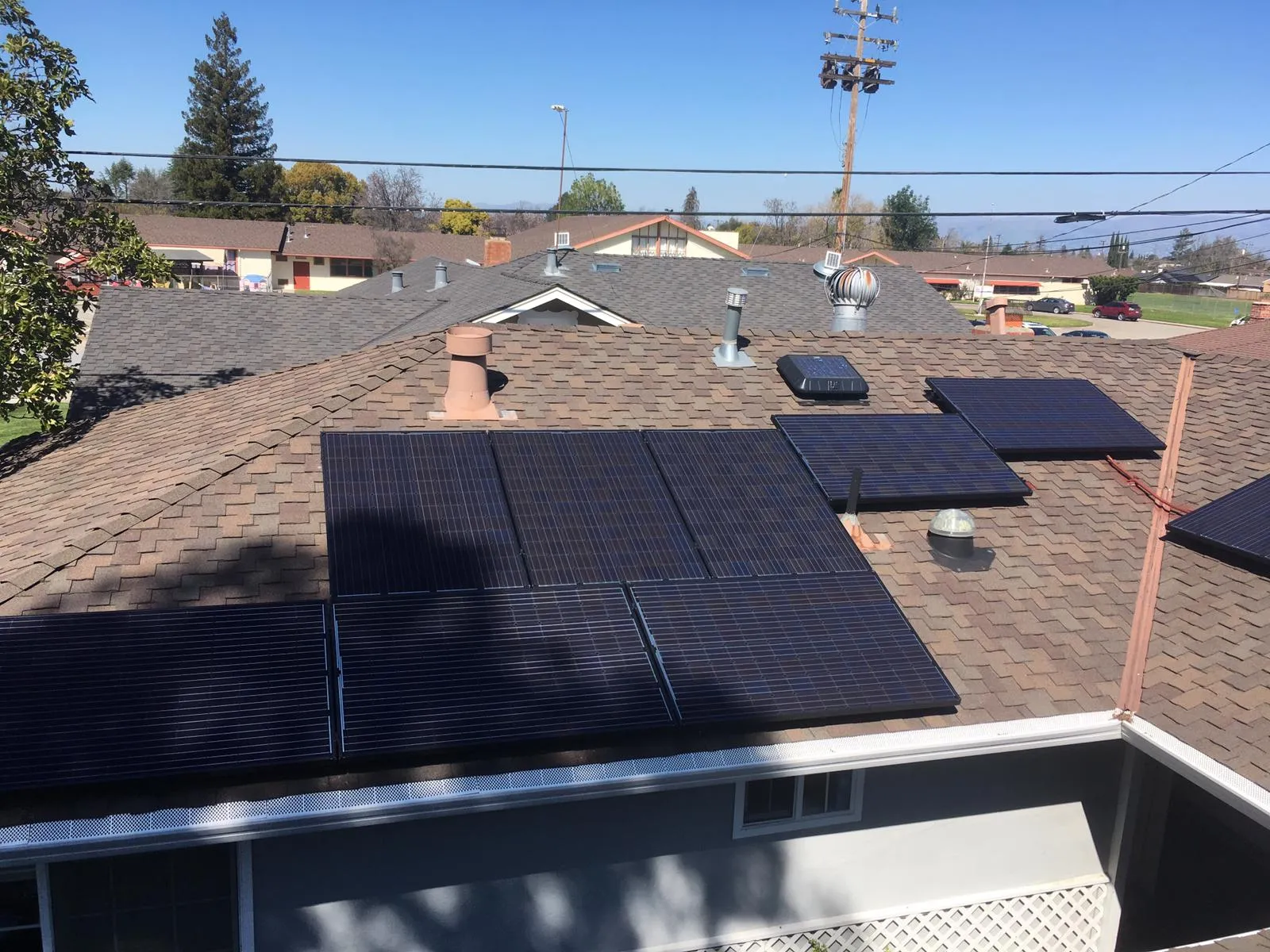 Picture of On a clear day, SolarUnion's expertly installed solar panels capture energy atop a suburban home, reflecting the companyâ€™s commitment to quality outcomes. With a focus on top-rated quality, SolarUnion continues to empower homes sustainably. Copyright ©2025 Diamond Certified Resource

 - SolarUnion