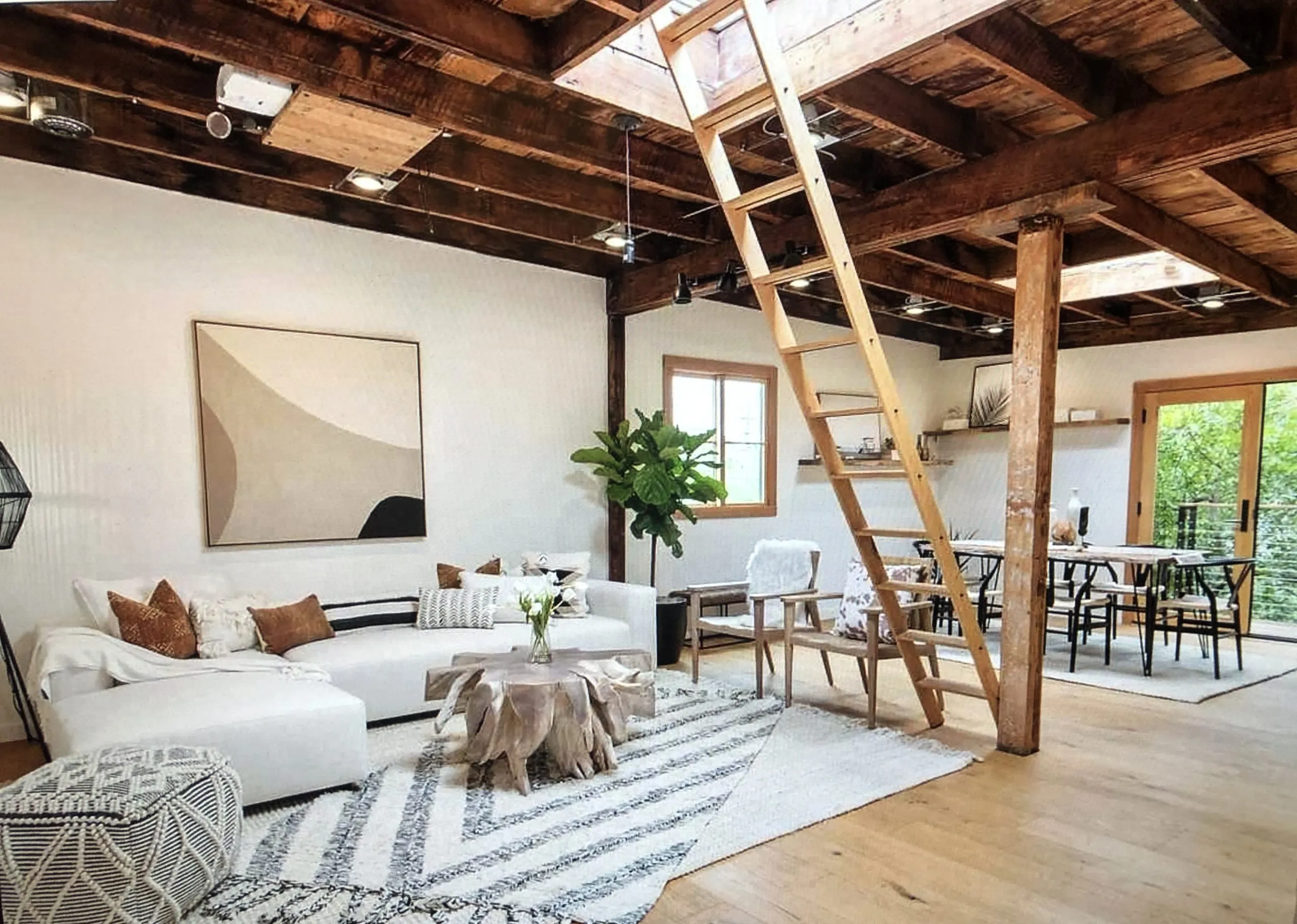 Picture of In a sunlit living space, a wooden ladder leads to a loft, embodying Green Living Builders LLC's commitment to quality outcomes. Recognized for expertise and quality, they transform interiors with natural materials and open design. Copyright ©2025 Diamond Certified Resource

 - Green Living Builders LLC