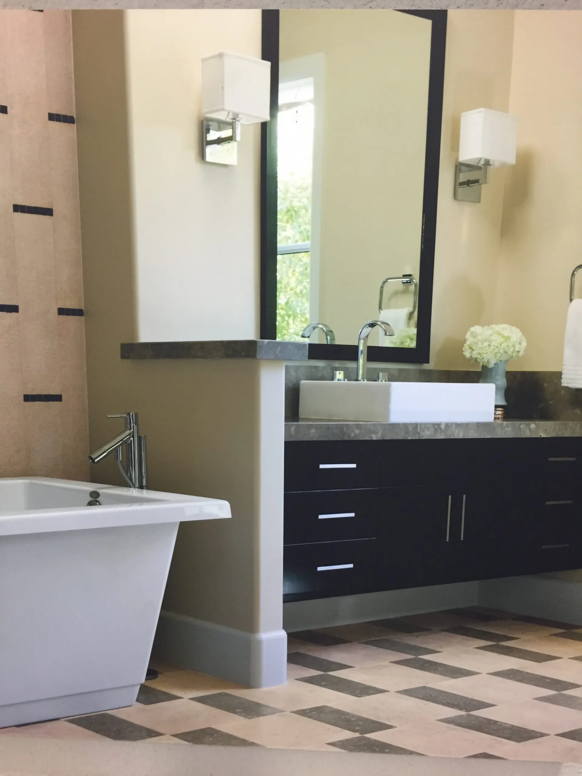 Picture of A serene bathroom showcases Green Living Builders LLC's commitment to quality outcomes, featuring a sleek modern bathtub and elegant vanity. Recognized for its expertise, the company enhances spaces with meticulous design. Copyright ©2025 Diamond Certified Resource - Green Living Builders LLC