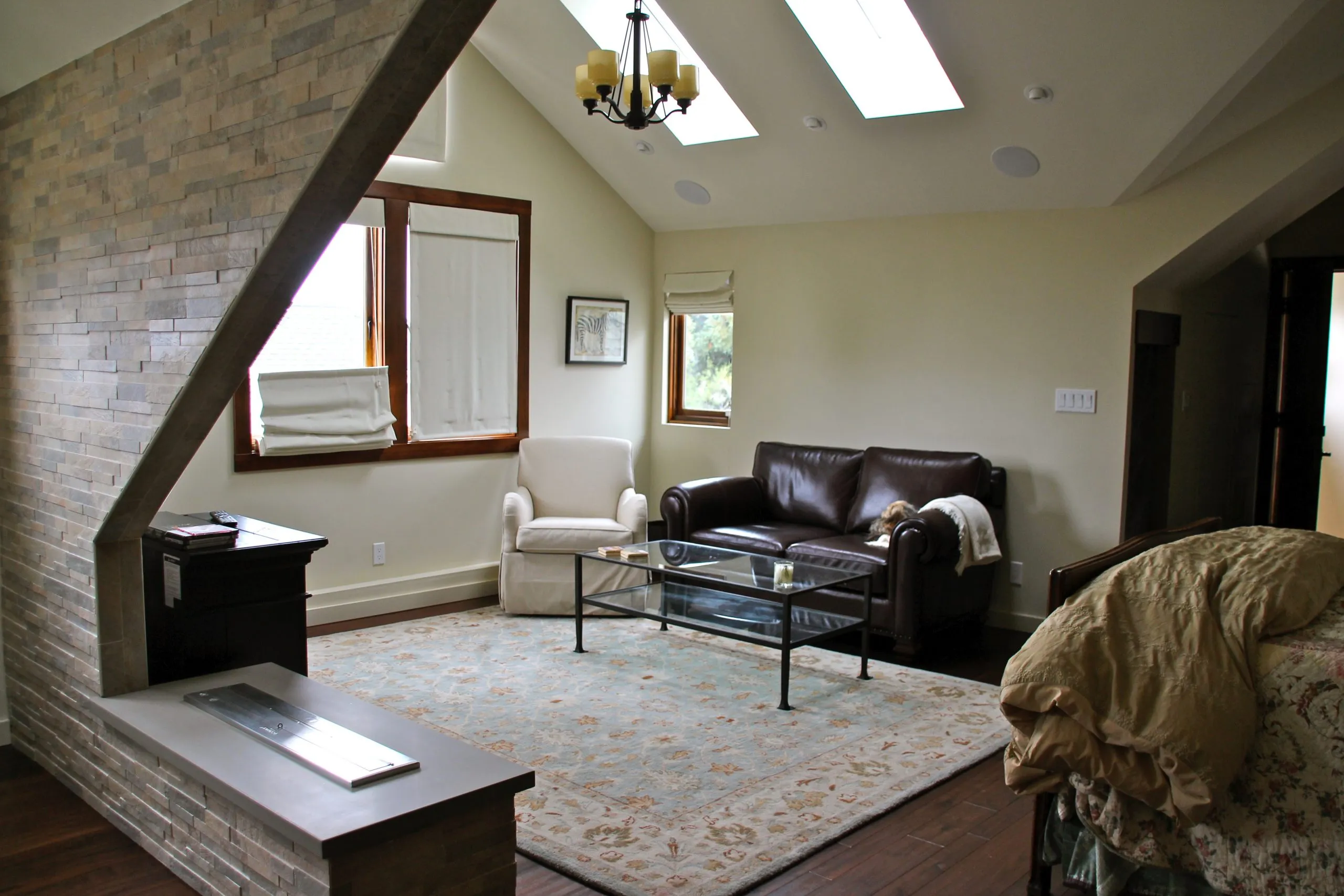 Picture of Natural light fills a serene living space featuring skylights and a sloped ceiling, showcasing Green Living Builders LLC's focus on quality outcomes. Copyright ©2025 Diamond Certified Resource

 - Green Living Builders LLC