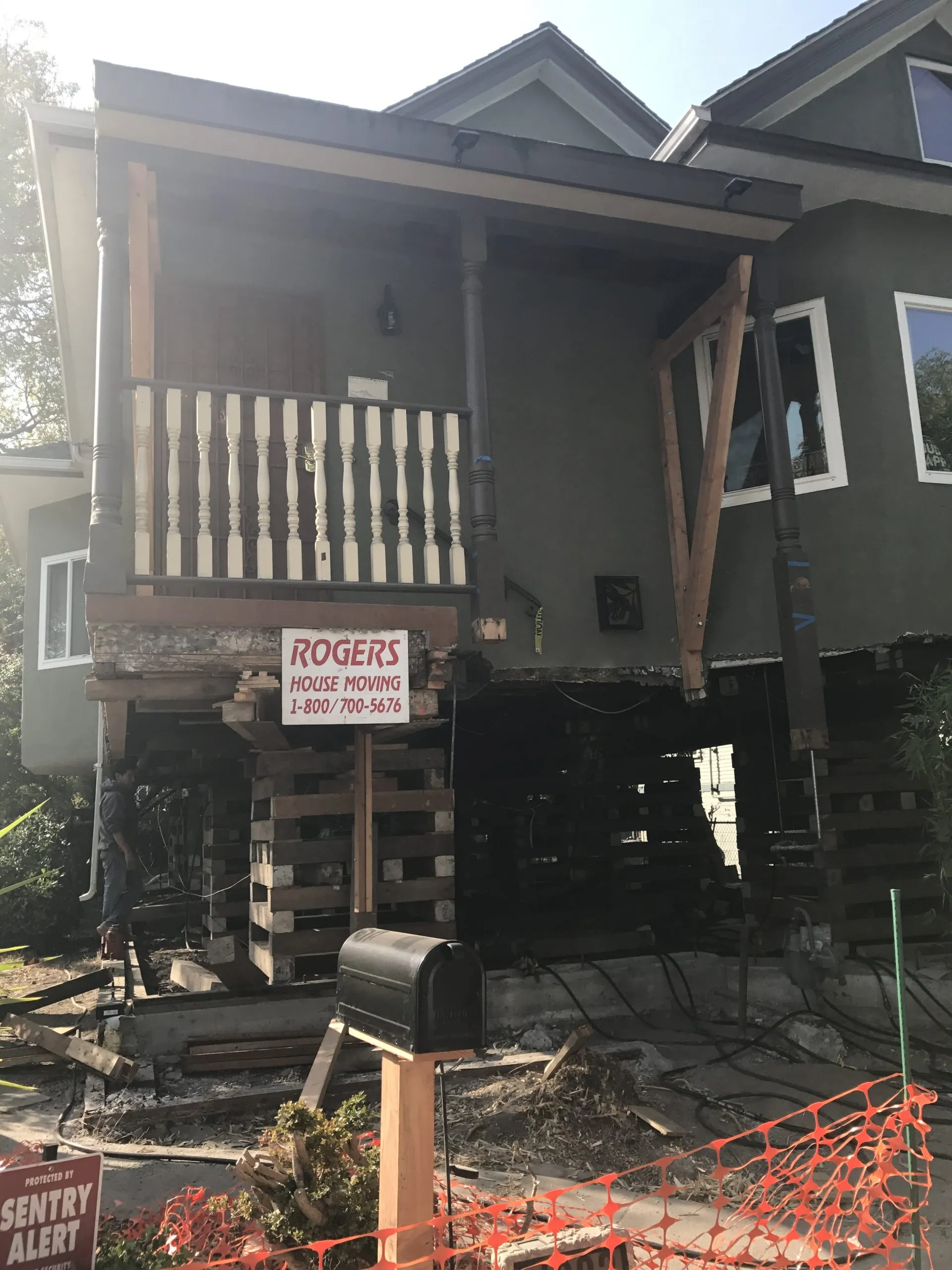 Picture of Amidst a transformative renovation, a house stands elevated on wooden blocks, revealing Green Living Builders LLC's emphasis on quality outcomes. Their commitment is further highlighted by the highest customer satisfaction ratings. Copyright ©2025 Diamond Certified Resource - Green Living Builders LLC