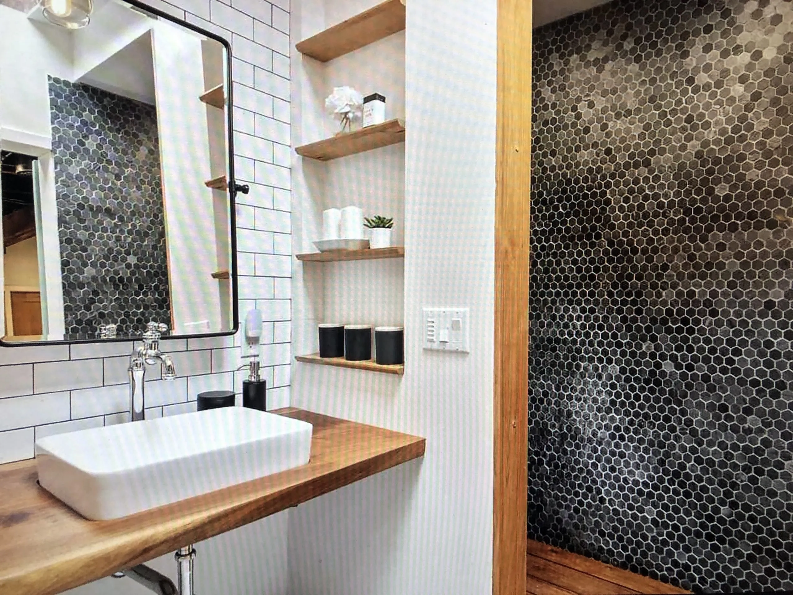 Picture of In a refined blend of modern and rustic, Green Living Builders LLC showcases their commitment to quality through meticulous design. This serene bathroom space echoes the companyâ€™s focus on quality outcomes. Copyright ©2025 Diamond Certified Resource

 - Green Living Builders LLC