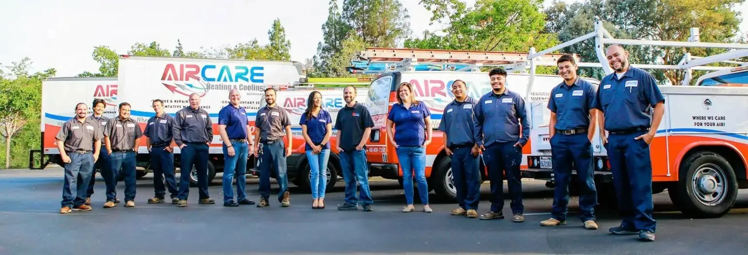 Picture of The team at Air Care Heating & Cooling, Inc. stands proudly beside their service vehicles, reflecting the companyâ€™s commitment to quality outcomes. Known for high customer satisfaction ratings, their dedication is evident in their unified presence. Copyright ©2025 Diamond Certified Resource

 - Air Care Heating & Cooling, Inc.