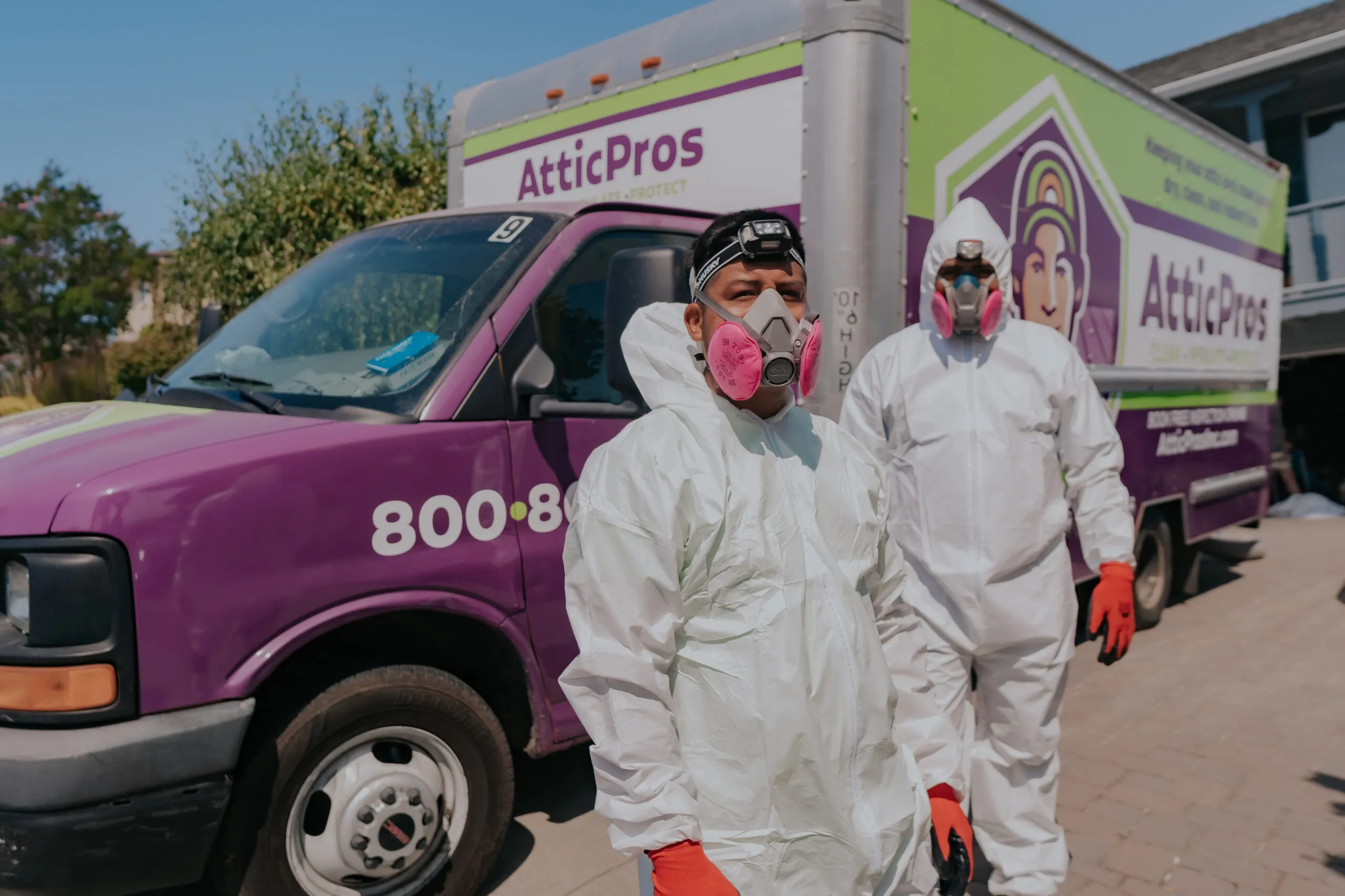 Picture of Two Attic Pros technicians, clad in protective gear, prepare for a vermin clean-up operation with precision and care. Their commitment to quality outcomes ensures homes remain safe and sound. Attic Pros consistently achieves a Highest in Quality rating. Copyright ©2025 Diamond Certified Resource

 - Attic Pros
