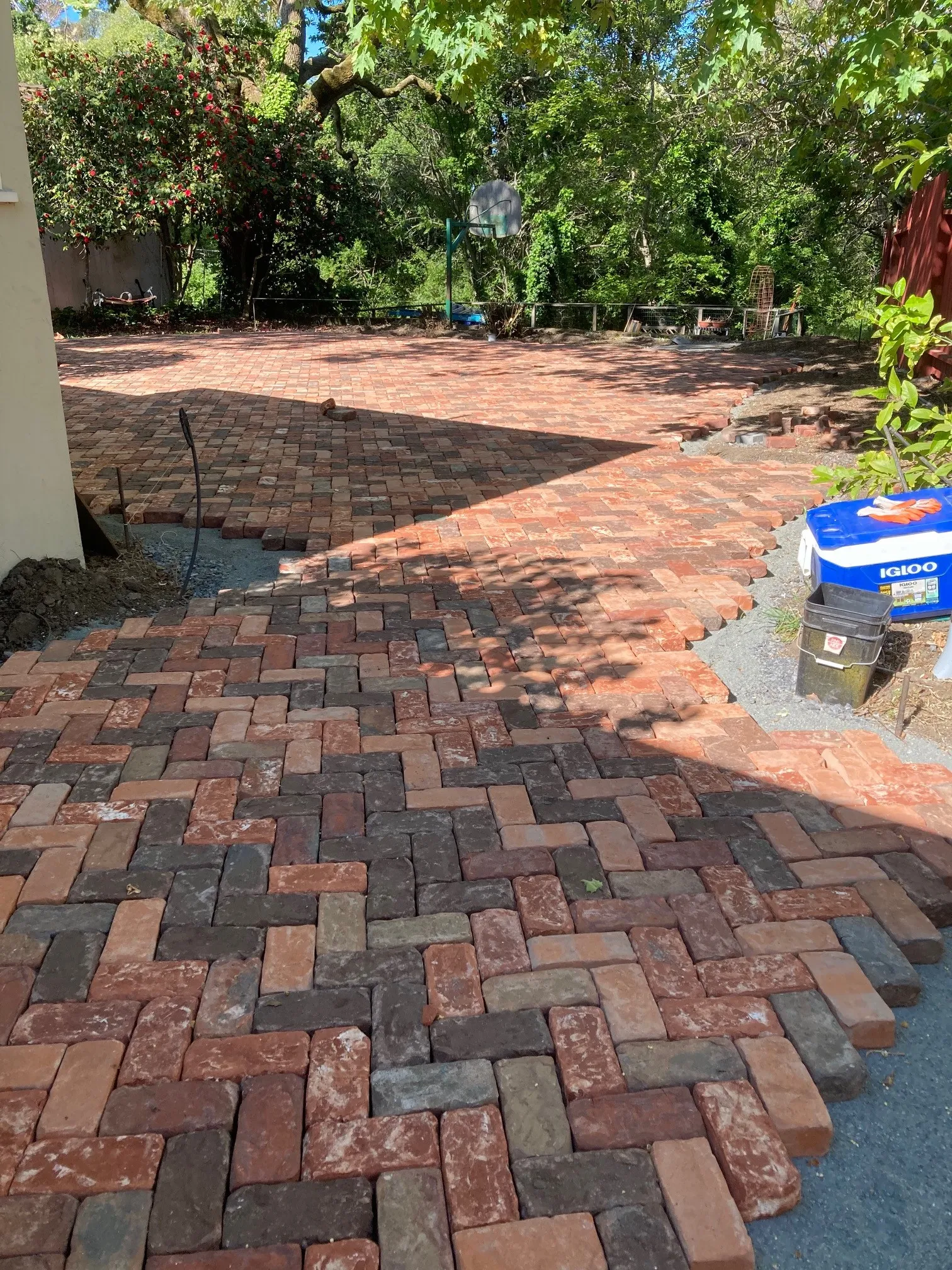 Picture of Sunlight dances through the trees, highlighting the intricate brickwork path crafted by The Legacy Paver Group. Their focus on quality outcomes is evident in every detail, reflecting their recognition for expertise and quality. Copyright ©2025 Diamond Certified Resource

 - The Legacy Paver Group